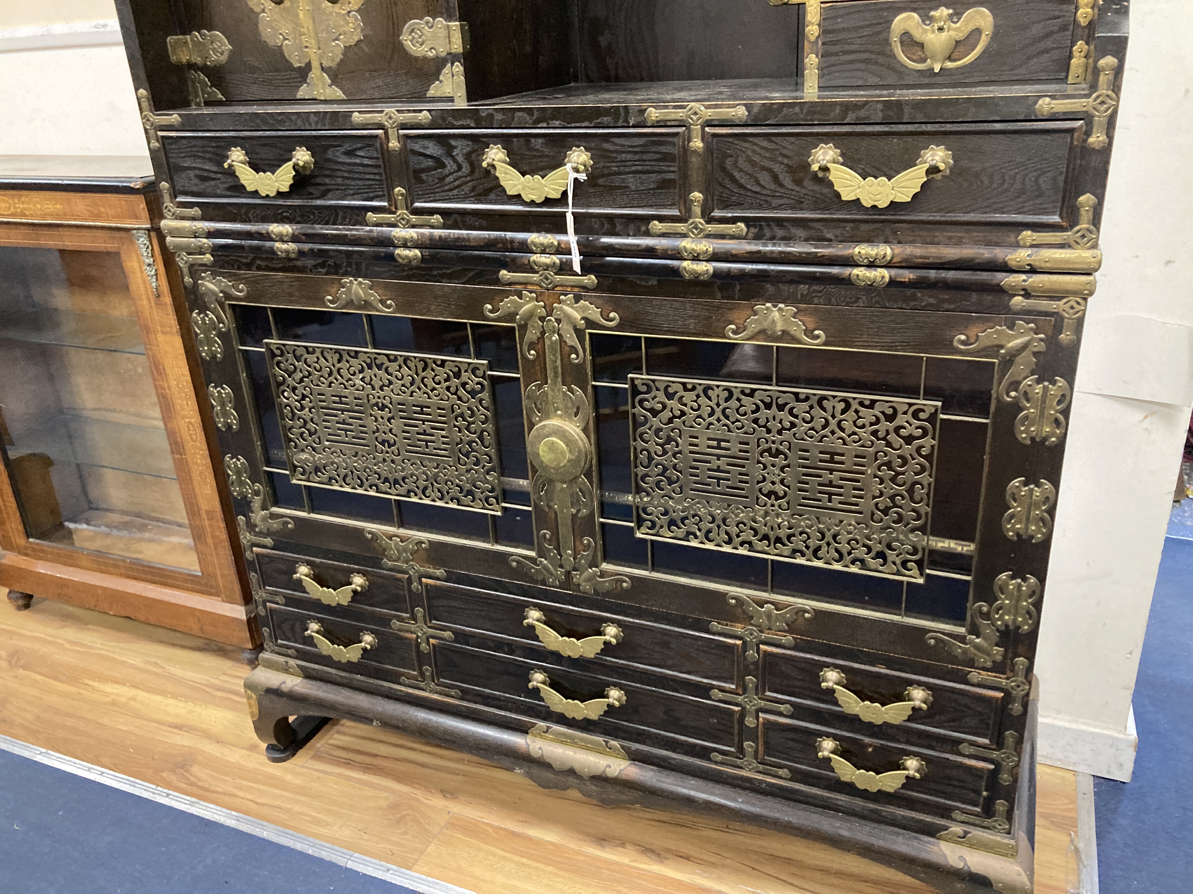 A Korean brass mounted elm cabinet, width 142cm, depth 48cm, height 190cm